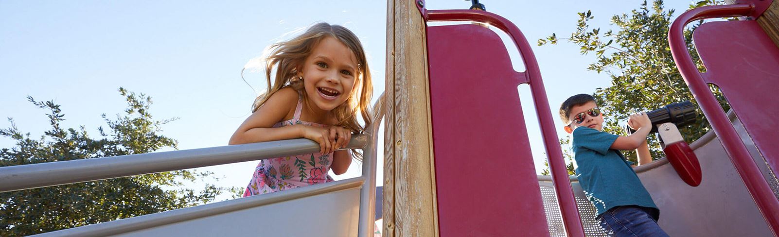 Children playing at park within the Alamar community in Avondale, AZ