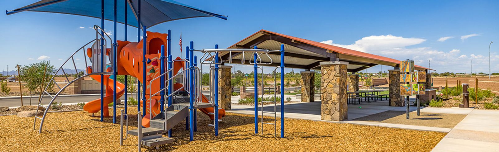 Yellowbell Court Park playground and covered structure at Alamar community in Avondale, Arizona